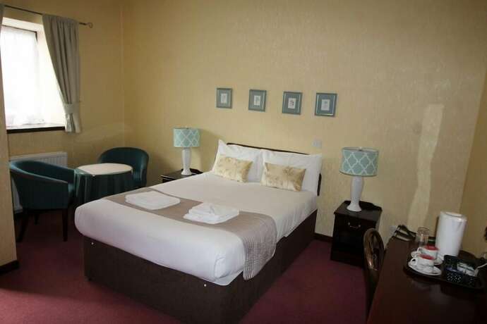 Imagen de la habitación del Hotel Achilty Guest House. Foto 17