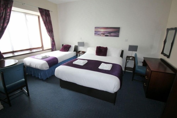 Imagen de la habitación del Hotel Achilty Guest House. Foto 18