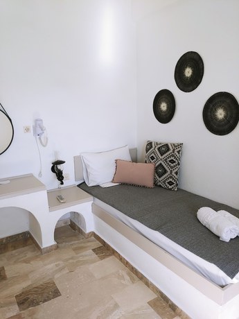 Imagen de la habitación del Hotel Achlia. Foto 16