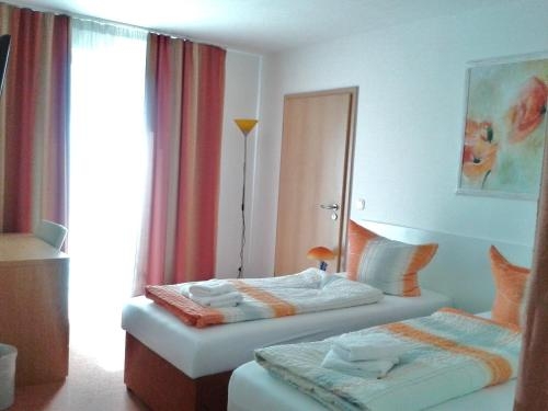 Imagen de la habitación del Hotel Ackermann. Foto 9