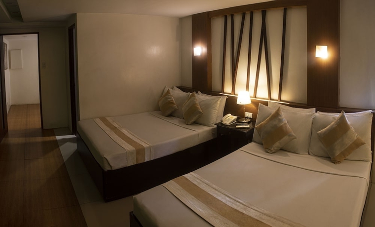 Imagen de la habitación del Hotel Acl Suites. Foto 1