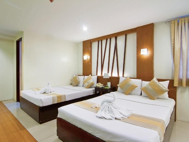 Imagen de la habitación del Hotel Acl Suites. Foto 2