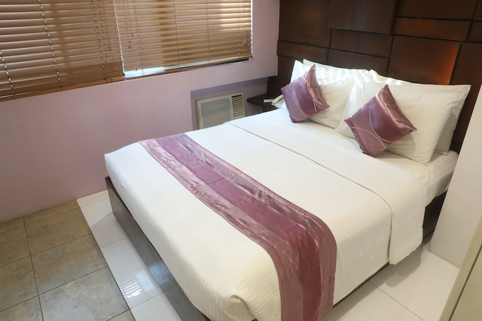 Imagen de la habitación del Hotel Acl Suites. Foto 4