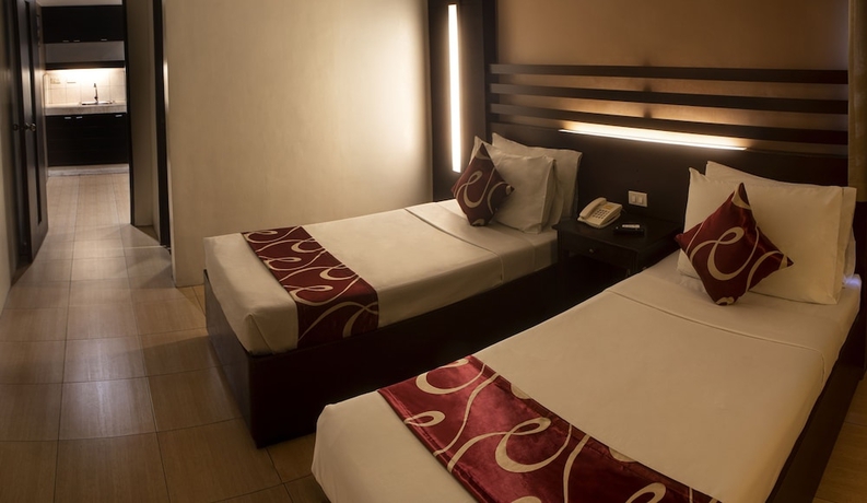 Imagen de la habitación del Hotel Acl Suites. Foto 10