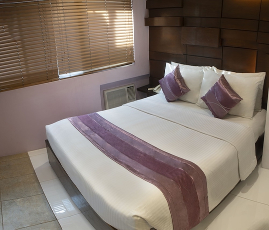 Imagen de la habitación del Hotel Acl Suites. Foto 11