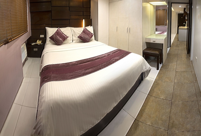 Imagen de la habitación del Hotel Acl Suites. Foto 12