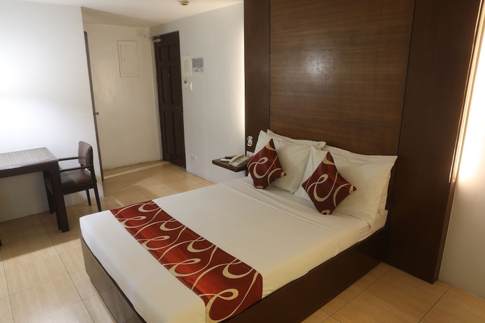 Imagen de la habitación del Hotel Acl Suites. Foto 13
