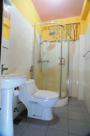 Imagen de la habitación del Hotel Acme Guest House. Foto 10