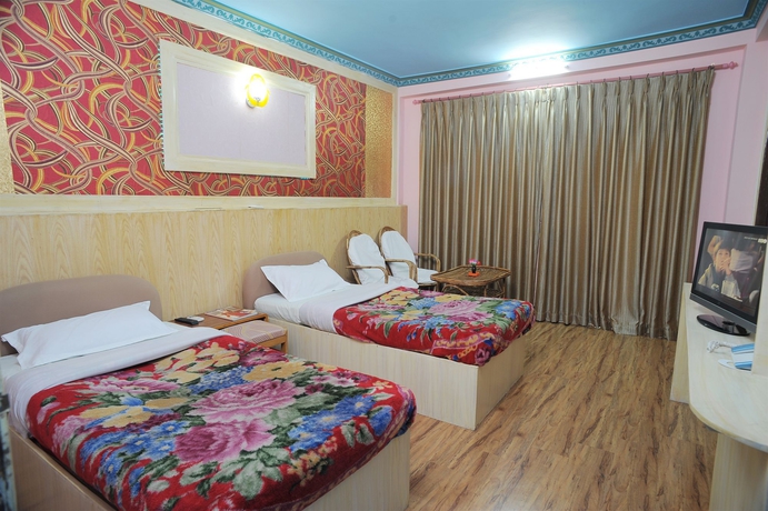 Imagen de la habitación del Hotel Acme Guest House. Foto 13