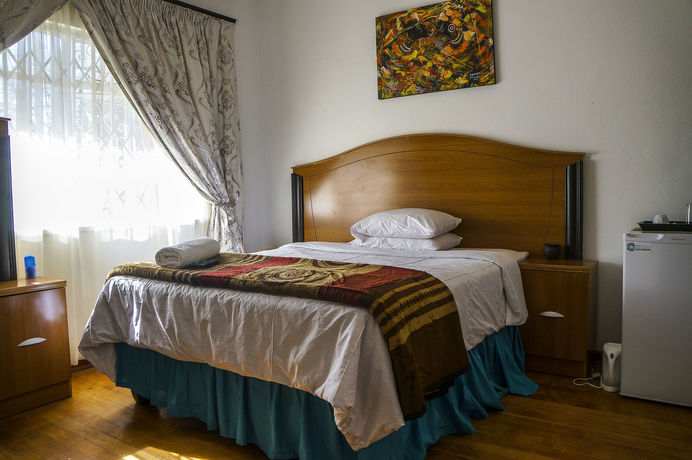 Imagen de la habitación del Hotel Acn International Regency Lodge. Foto 8