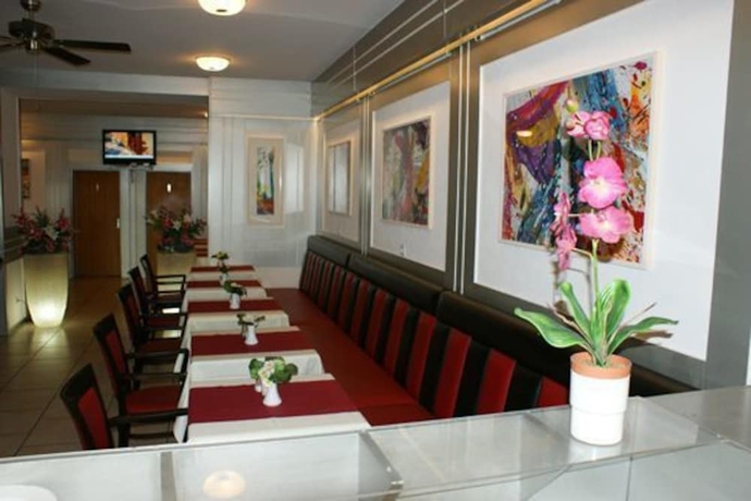 Imagen del bar/restaurante del Hotel Acon. Foto 7