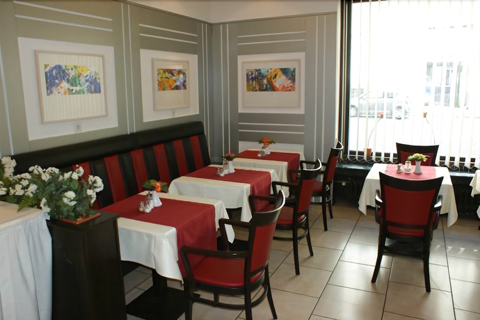 Imagen del bar/restaurante del Hotel Acon. Foto 8
