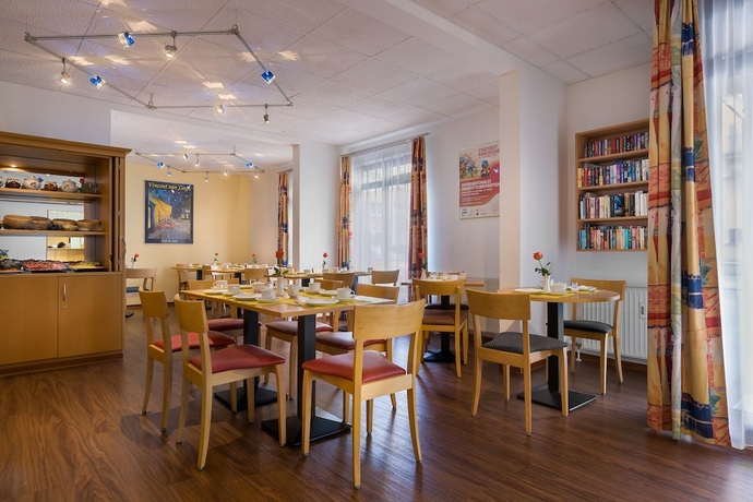 Imagen del bar/restaurante del Hotel Acora Karlsruhe Zentrum Living The City. Foto 5