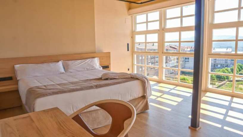 Imagen de la habitación del Hotel Acouga Boutique. Foto 10