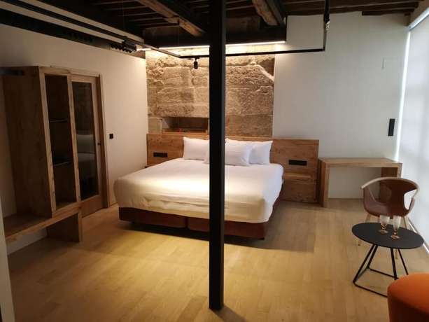 Imagen de la habitación del Hotel Acouga Boutique. Foto 12