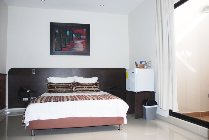 Imagen de la habitación del Hotel Acqua Medellín. Foto 1