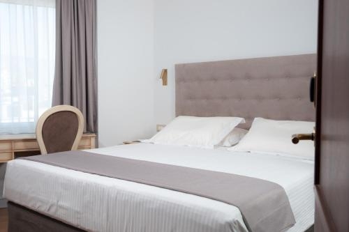 Imagen de la habitación del Hotel Acropolian Spirit Boutique. Foto 6