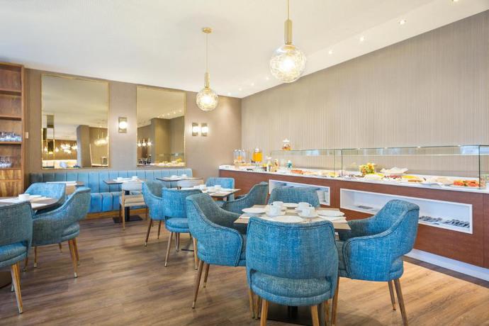 Imagen del bar/restaurante del Hotel Acta The Avenue. Foto 3