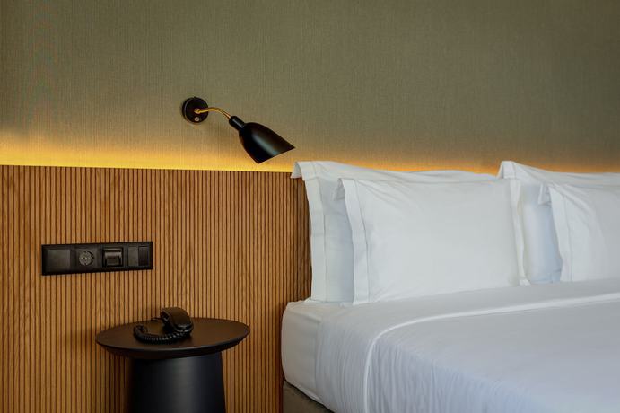 Imagen de la habitación del Hotel Acta The Clover. Foto 10