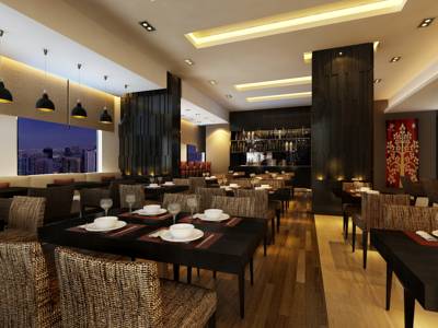 Imagen del bar/restaurante del Hotel Action Ras Al Khaimah. Foto 5