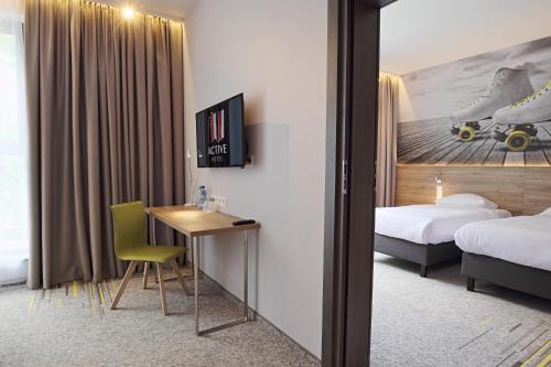 Imagen de la habitación del Hotel Active. Foto 6