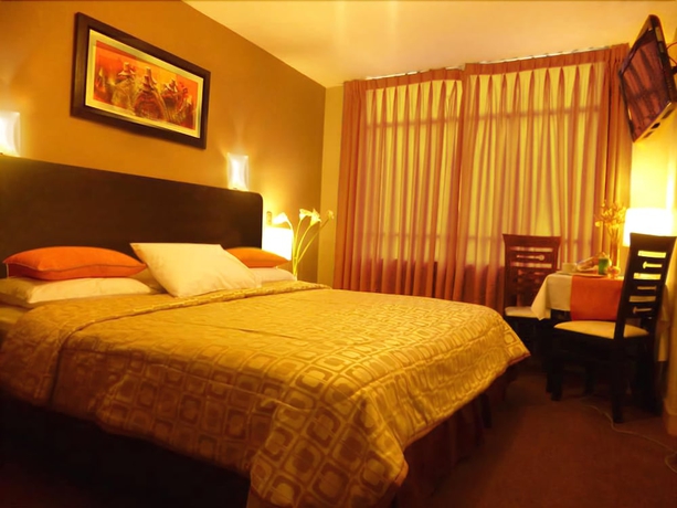 Imagen de la habitación del Hotel Acuario and Suites. Foto 12