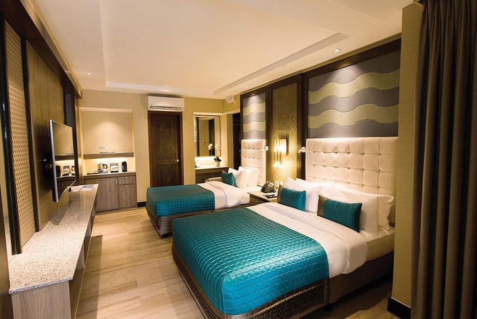 Imagen de la habitación del Hotel Acuatico Beach Resort. Foto 10