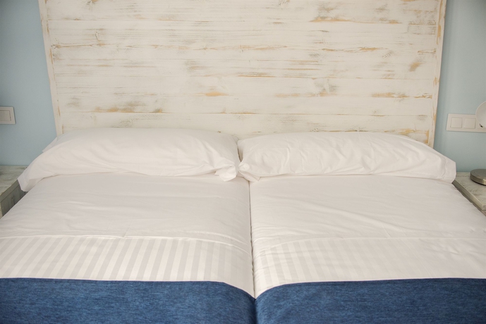 Imagen de la habitación del Hotel Ad Hoc Carmen. Foto 12