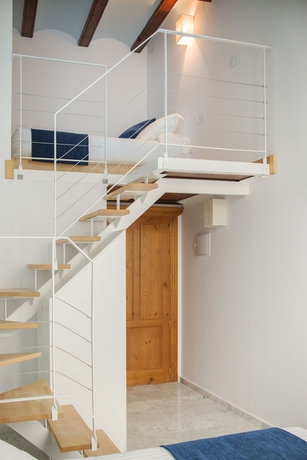 Imagen de la habitación del Hotel Ad Hoc Carmen. Foto 15