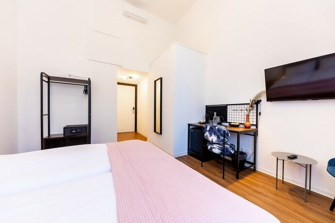 Imagen de la habitación del Hotel Adagio Downtown Rooms. Foto 12