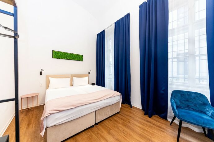 Imagen de la habitación del Hotel Adagio Downtown Rooms. Foto 13