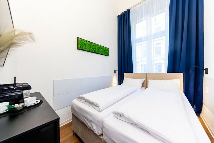 Imagen de la habitación del Hotel Adagio Downtown Rooms. Foto 15