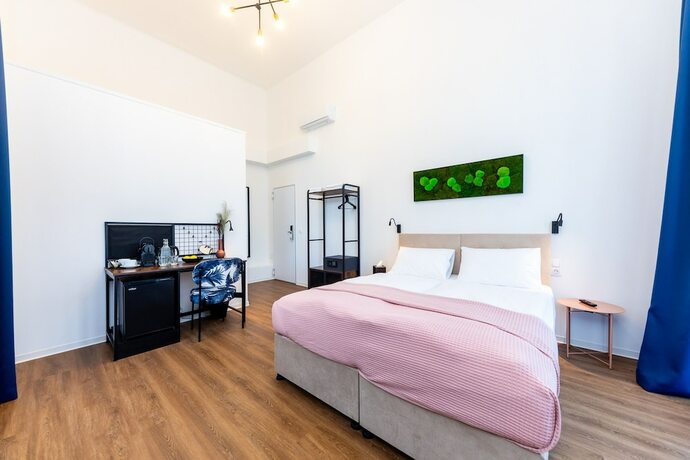 Imagen de la habitación del Hotel Adagio Downtown Rooms. Foto 18