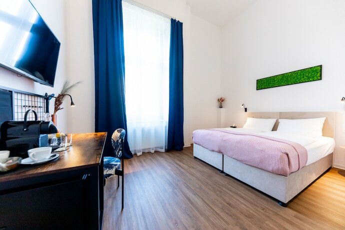 Imagen general del Hotel Adagio Downtown Rooms. Foto 7