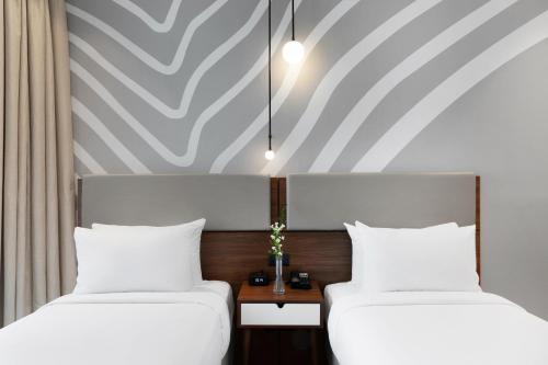 Imagen de la habitación del Hotel Adagio Premium The Palm. Foto 10