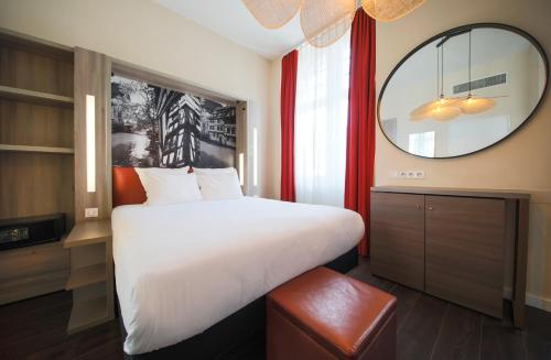 Imagen de la habitación del Hotel Adagio Strasbourg Place Kleber. Foto 4
