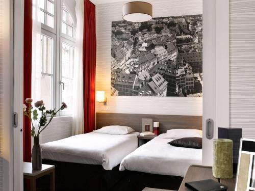 Imagen de la habitación del Hotel Adagio Strasbourg Place Kleber. Foto 5