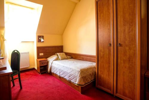 Imagen de la habitación del Hotel Adalbertus. Foto 8