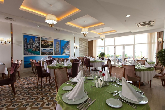 Imagen del bar/restaurante del Hotel Adalya Ocean - All Inclusive. Foto 1