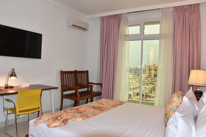 Imagen de la habitación del Hotel Adamaoua Grand Hotel City. Foto 19