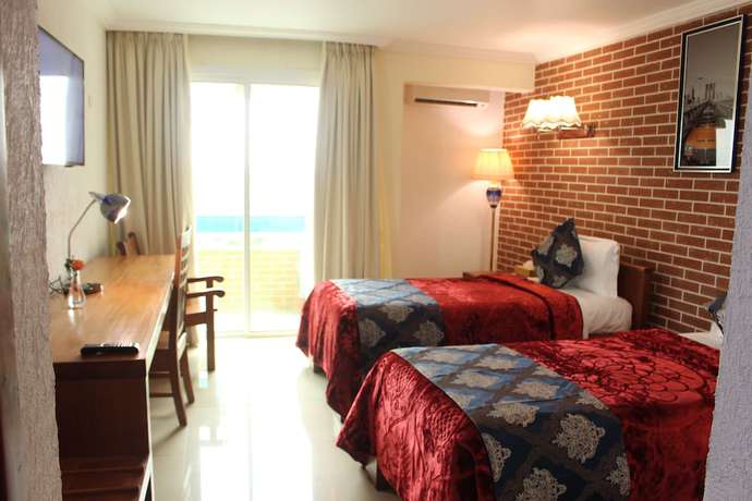 Imagen de la habitación del Hotel Adamaoua Grand Hotel. Foto 16