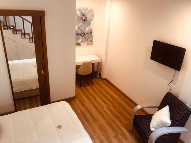 Imagen de la habitación del Hotel Adamas House. Foto 13