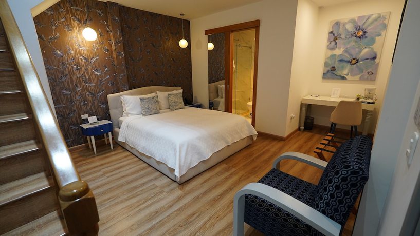 Imagen de la habitación del Hotel Adamas House. Foto 16