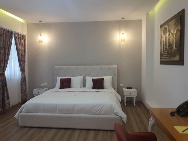 Imagen de la habitación del Hotel Adamas House. Foto 17