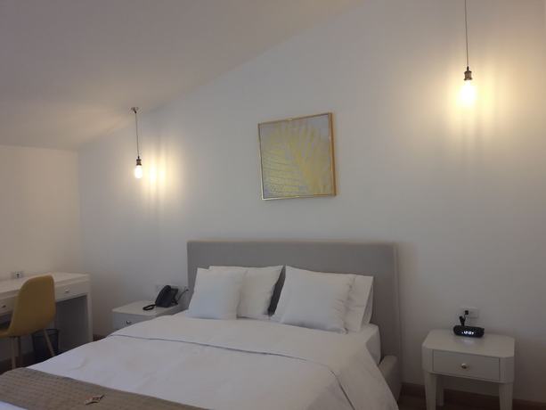 Imagen de la habitación del Hotel Adamas House. Foto 19