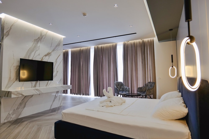 Imagen de la habitación del Hotel Adamas Resort and. Foto 5