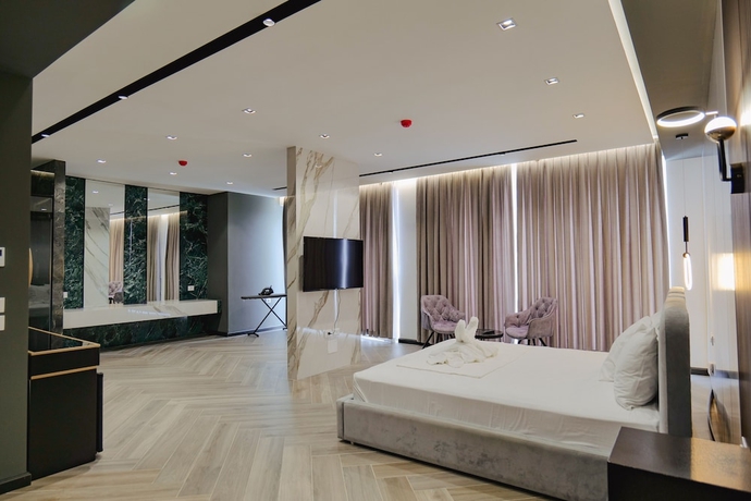 Imagen de la habitación del Hotel Adamas Resort and. Foto 7