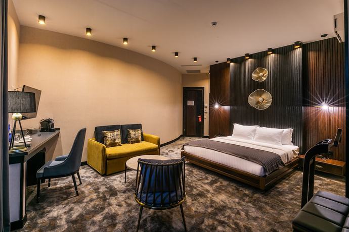 Imagen de la habitación del Hotel Adamo, Tbilisi. Foto 2
