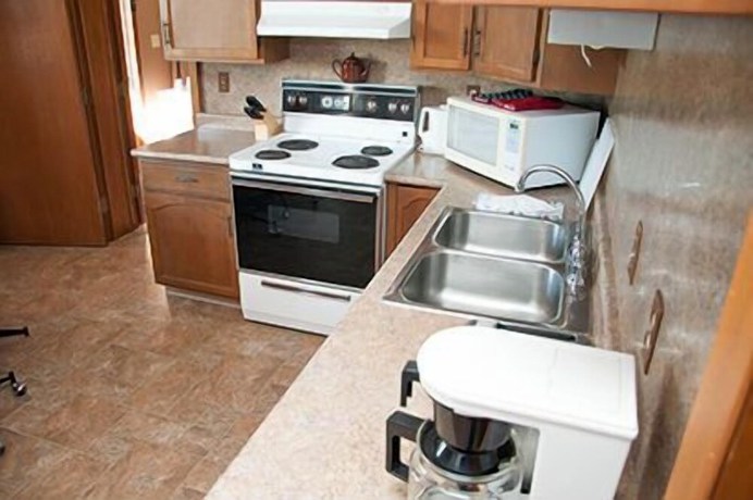 Imagen de la habitación del Hotel Adams Golden Acres Motel. Foto 6