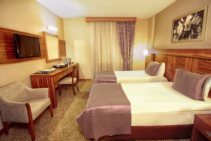 Imagen de la habitación del Hotel Adana Garden Business. Foto 10